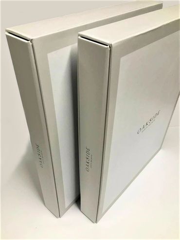 Modern book clamshell boxes with refined detailing and durable build.