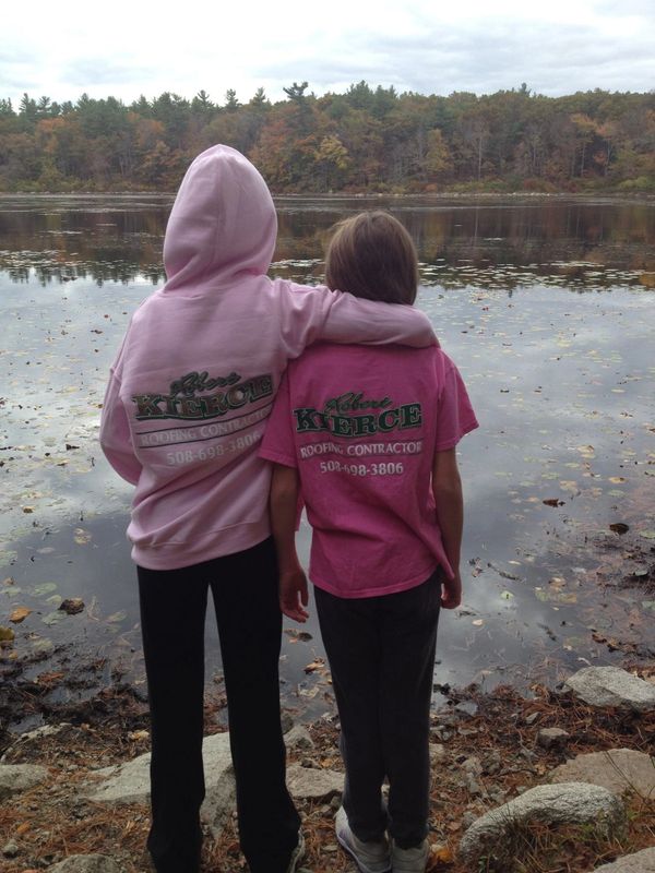 Our Pink shirts & Sweatshirt girls standing looking out over the lake