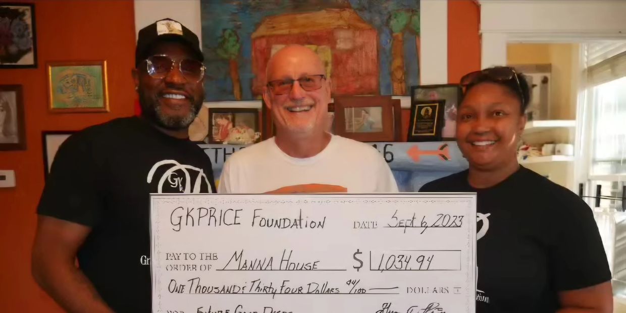 Greg and Kim of the GKPRICEFOUNDATION  donating $1034.94 to Pastor Pete of Manna House
