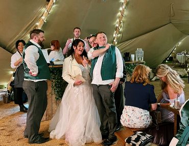 Bride and groom enjoying our mobile bar at their tipi wedding