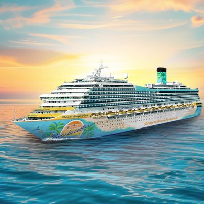 A large, colorful cruise ship sailing on calm waters at sunset.