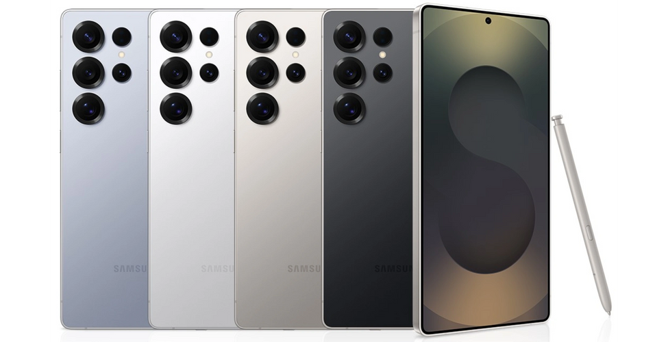 Woman in yellow shirt testing a smartphone in a tech store.