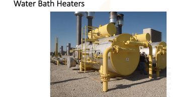 Shows water bath heater at a natural gas pressure reducing station city gate for a major gas utility