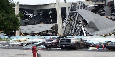 Site of conagra garner NC explosion in 2009 shows xterior building collapsed in parking lot and dama