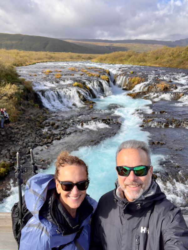Stephanie and David at an Icelandic waterfall in September 2024
