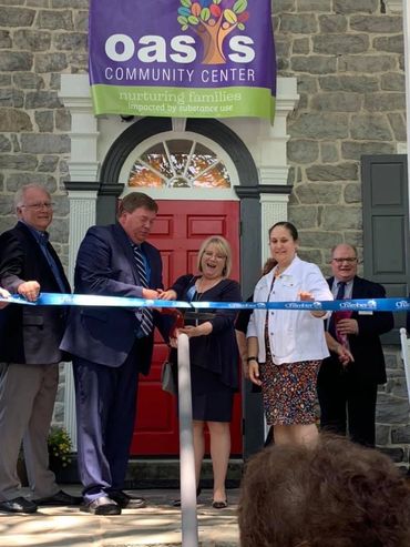 Northampton County Executive Lamont McClure (center), along with Secretary Jennifer Smith (right) as