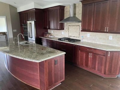 Walnut cabinets and granite kitchen remodeling