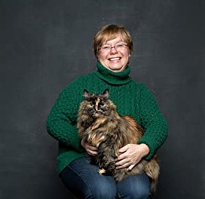 Woman with cat on her lap