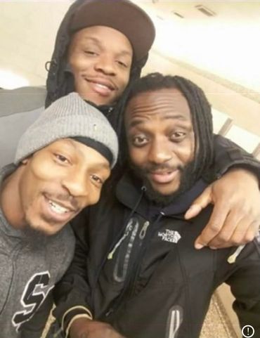 Three friends meet each other and looking front on the camera