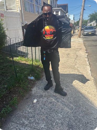 A man wearing jacket and looking front on the camera