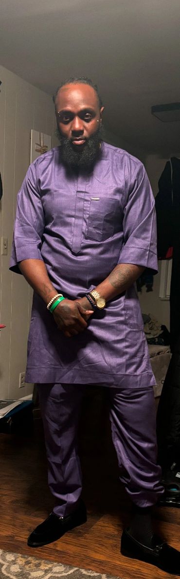 A man inside the home and looking ahead