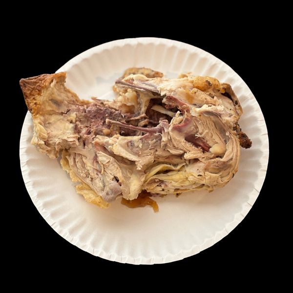 A paper plate with some food on it