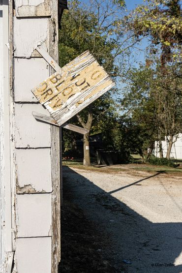 Side of building with sign that says "Do not block drive"