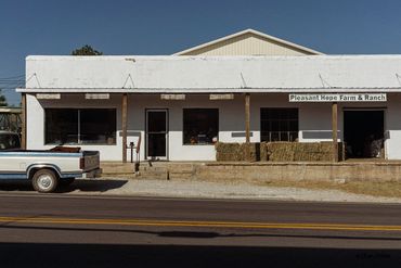 Truck in front of farm market