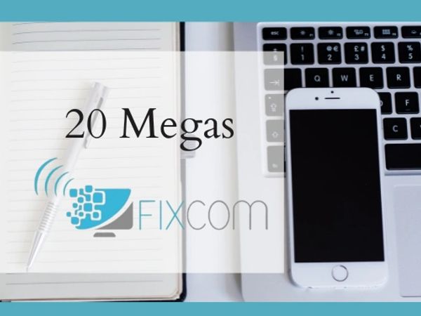 Tech setup with laptop, phone, and notebook, promoting 20 Megas internet by Fixcom.