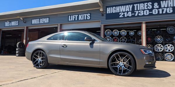 Black rims with tires as a package deal for a fair price and excellent service.