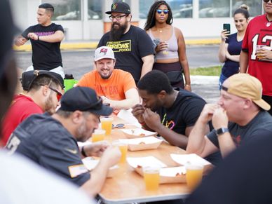 Patrons enjoying craft beer and conversation in a popular D.C. brewery at the Navy Yard Brewery Tour.