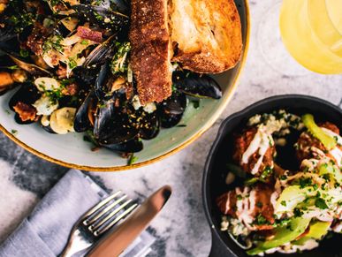 Having a delicious meal at H&U Corridor Food Tour.