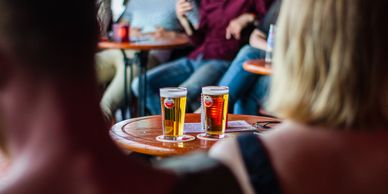 People enjoying craft beer at a Brewery Tour, transfer tours