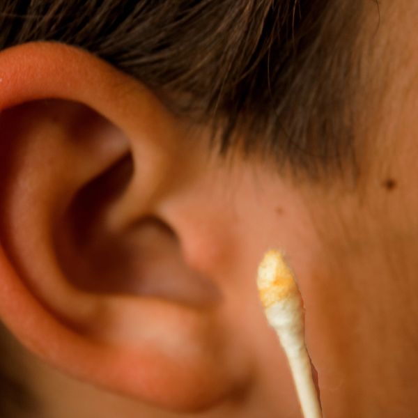 Ear with cotton bud