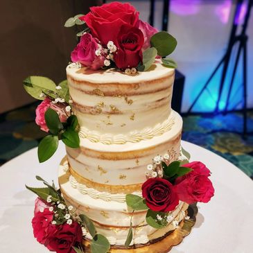Naked Wedding Cake with Flower Arrangement