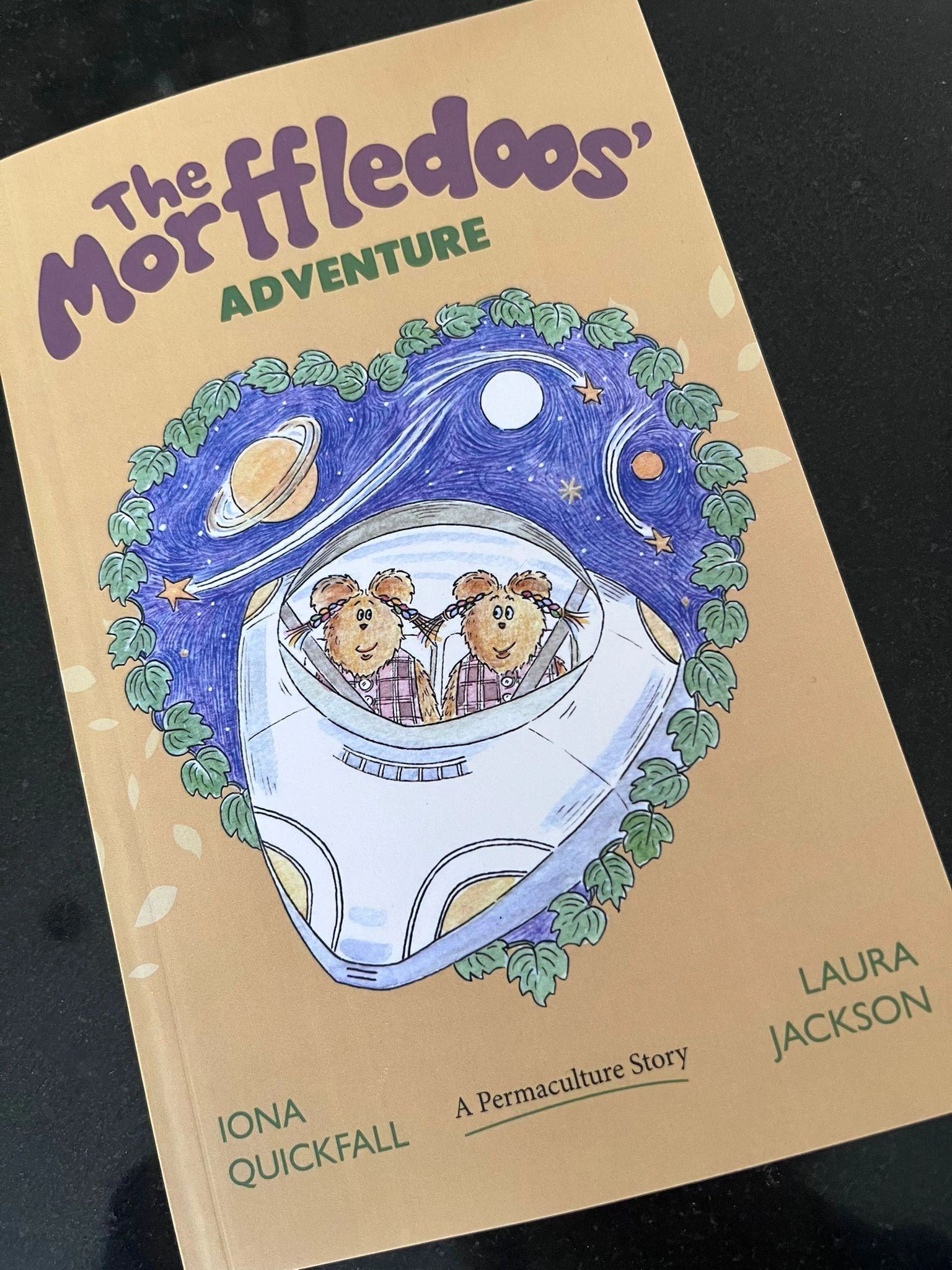 Cover of 'The Morffledoos' Adventure' children's book with two furry characters in a spaceship.