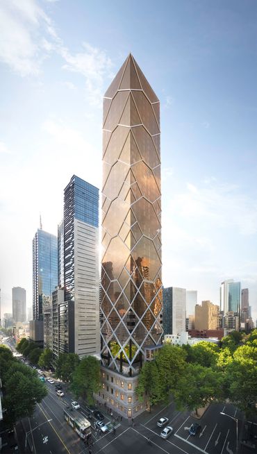 A modern skyscraper with a geometric gold facade towering in a cityscape.