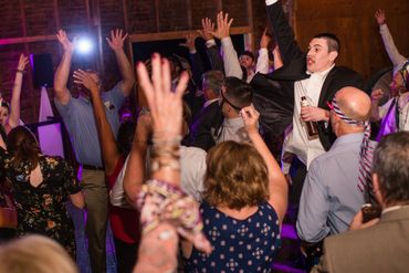 DJay 360 hype crowd at a barn wedding.