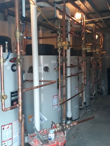 Newly installed hot water heaters in a commercial building in Central PA