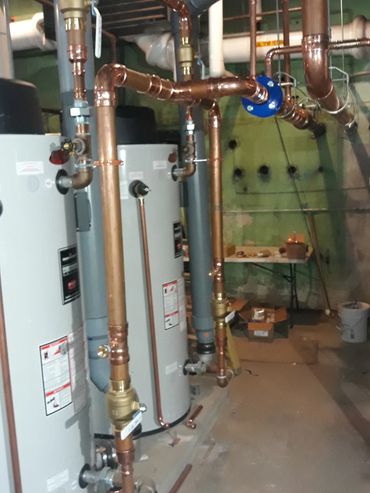 New piping and water heaters on a commercial project in Hershey, PA.