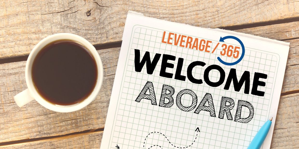 Welcome aboard message with coffee cup and pen.