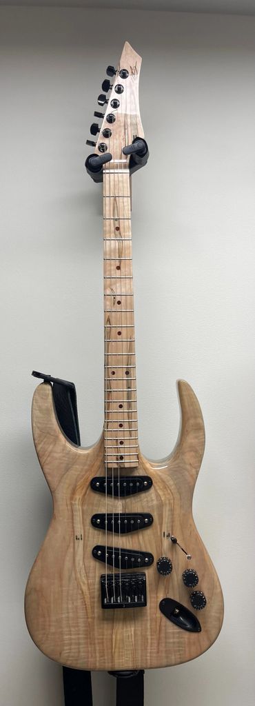 XS Ambrosia maple "long-horn" 6 string guitar with ambrosia maple fingerboard.