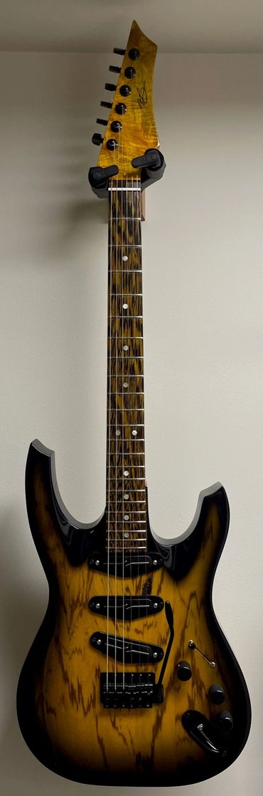 XS Yellow Zebra 6 string guitar with matching Wenge fingerboard.