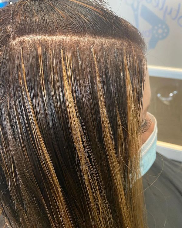 using fusion bond hair extensions to create highlights in the hair