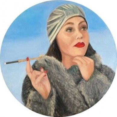 Woman in vintage attire holding a cigarette holder.