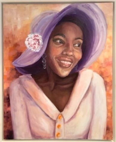 Portrait of a smiling woman in a lavender hat and dress.