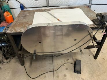 We designed/fabricated this custom pressure washing deck for a riding mower for a business owner.