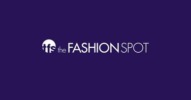 Logo of The Fashion Spot with white text on a dark purple background.