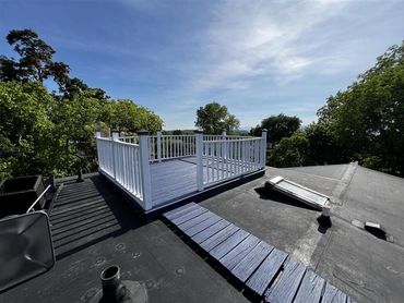 Refinished and repaired roof deck