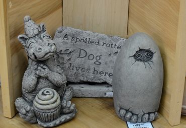 Stone Garden Accent Pieces by Massarelli.
Dragon and fun saying. 