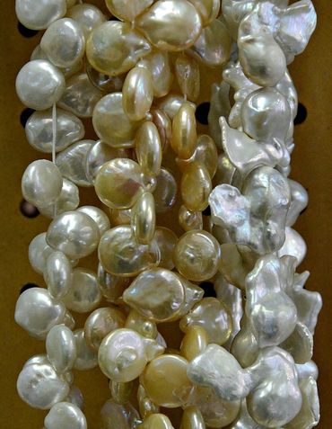 Baroque strand beads .  White Baroque Pearls.  Cream Baroque Pearls. Top Drill pearl beads