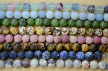 Beads in shiny and matte, round beads and shapes beads.  coins,  square, rondelle, faceted rondelle.