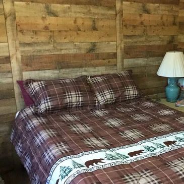 Cozy cabin with queen size bed perfect for a romantic getaway or a single retreat.  Firepit.  Pond.