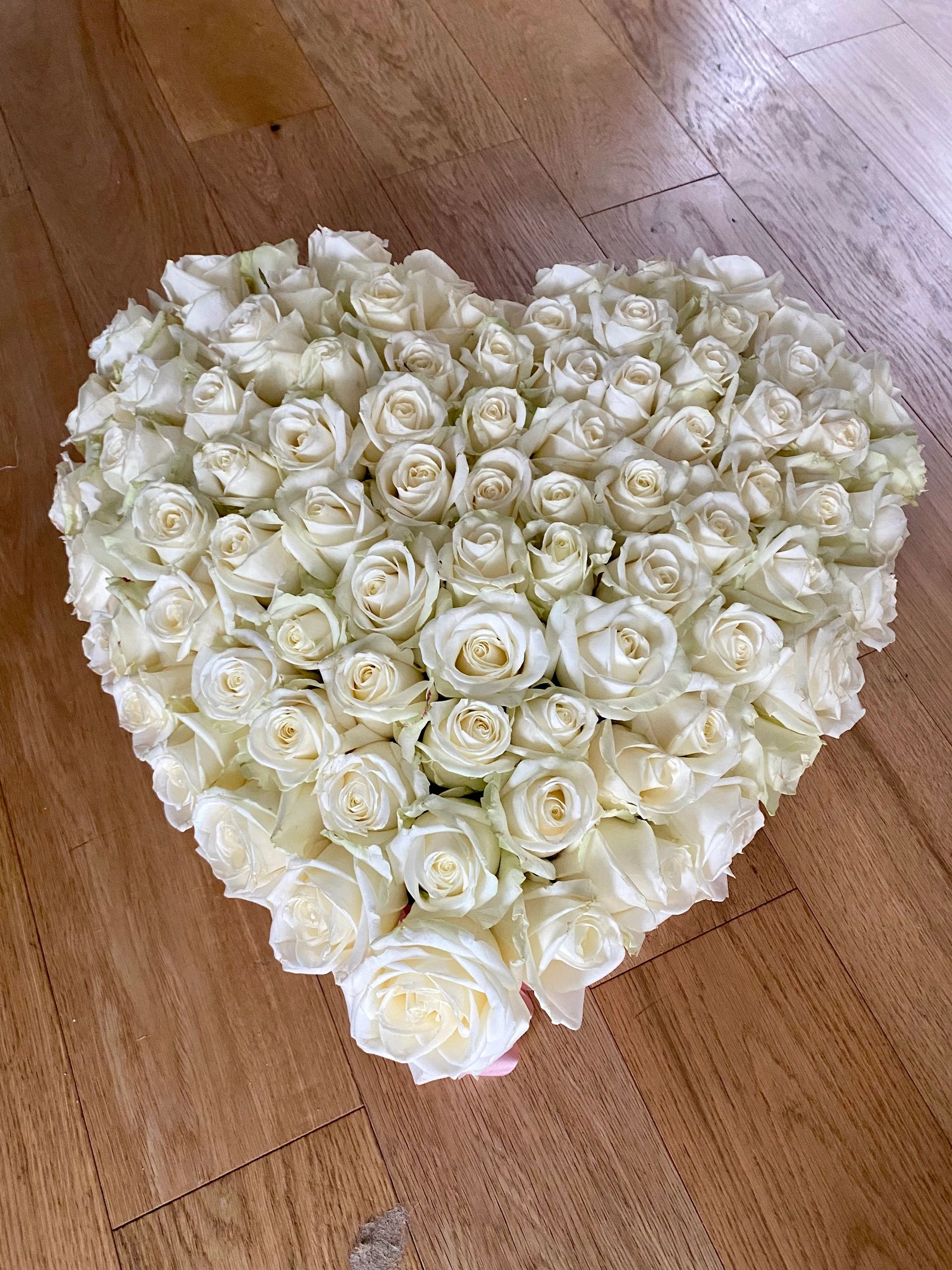 White roses funeral heart