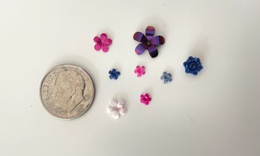 Blue, pink, glittery and iridescent hand-cast resin flowers