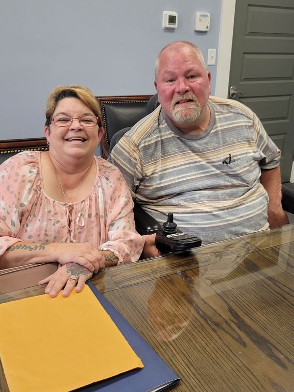 Happy clients - just finished closing on their new home