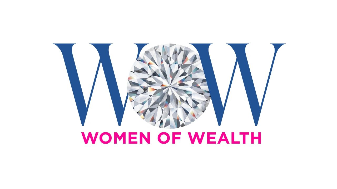 Logo with a diamond and text Women of Wealth in blue and pink.