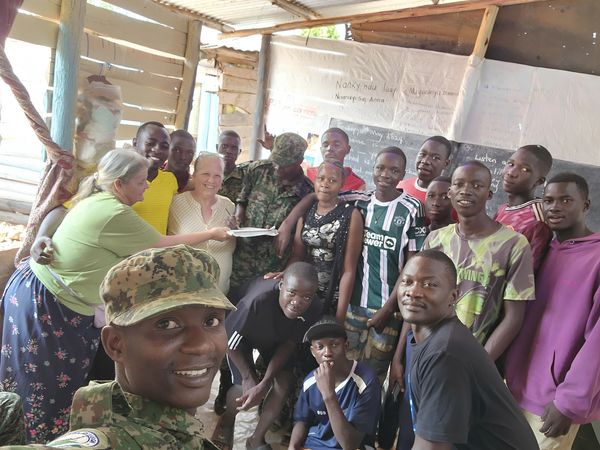 Community fellowship during outreach gathering