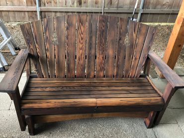 Homemade rocking bench with custom cutout design