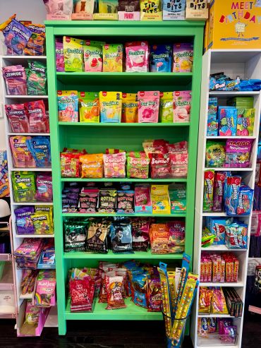 Candy display with assorted imported candy and sweets. Joyride and Squashies to name a few.